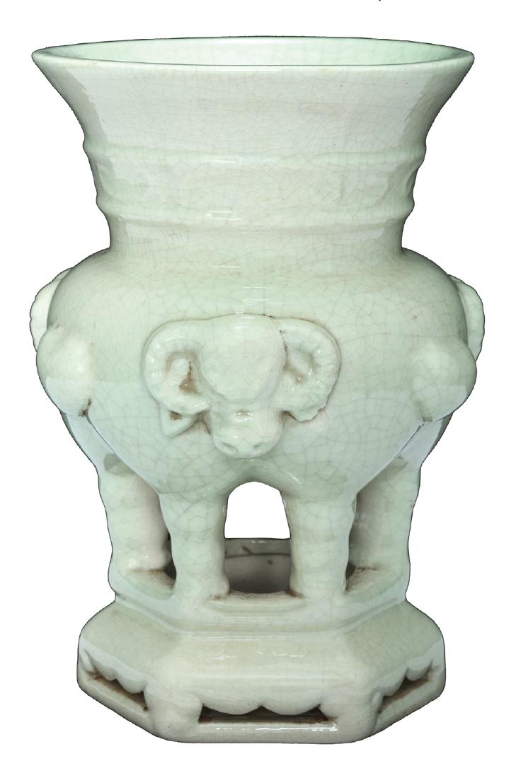A SONG STYLE CRACKLE CELADON GLAZE CENSER: 19th century Modelled with ram heads raised on six legs on a hexagonal base 17 cm high (Minor chip to top rim)