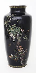 A JAPANESE CLOISONNE ENAMEL VASE: Circa 1890-1900 Remarkably decorated with birds, flowers and foliage on a dark blue ground The silver rim of base marked 31 cm high Provenance: Rutie Ofer Collection