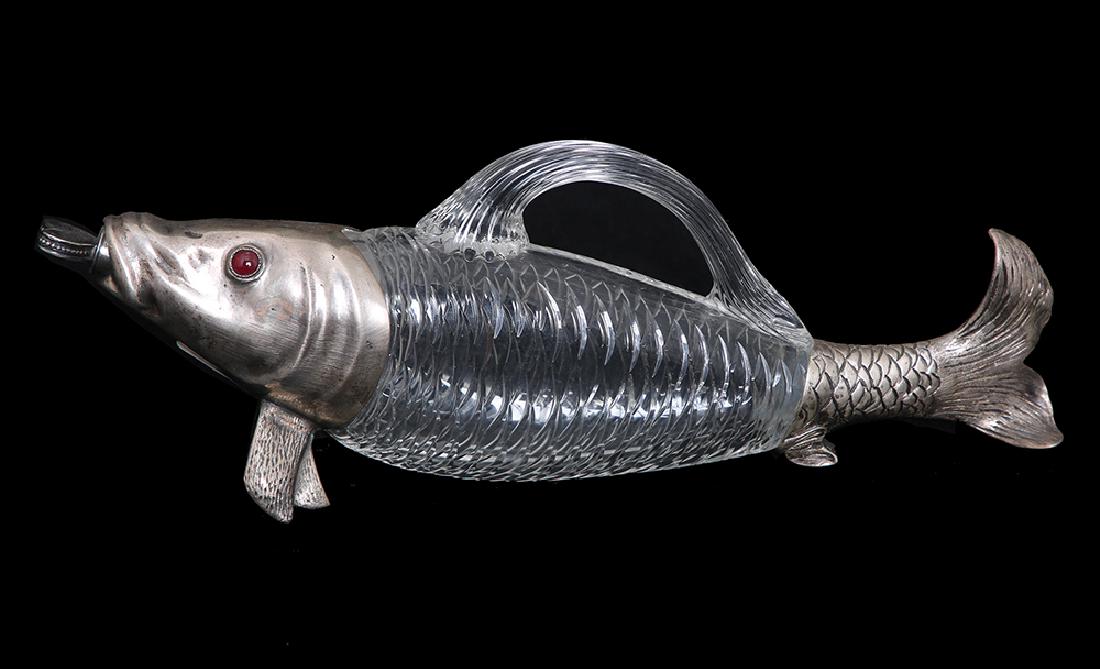 A SILVER MOUNTED GLASS DECANTER (1 of 1)