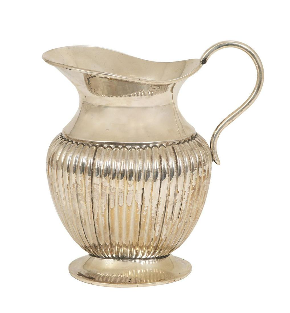 A SILVER WATER JUG (1 of 1)