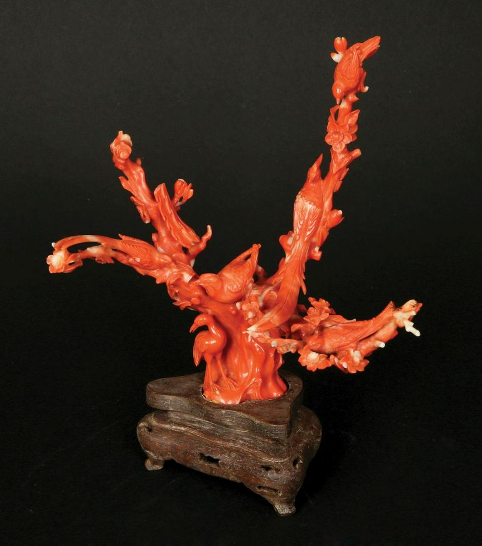 A CHINESE CARVED RED CORAL SCULPTURE (1 of 1)