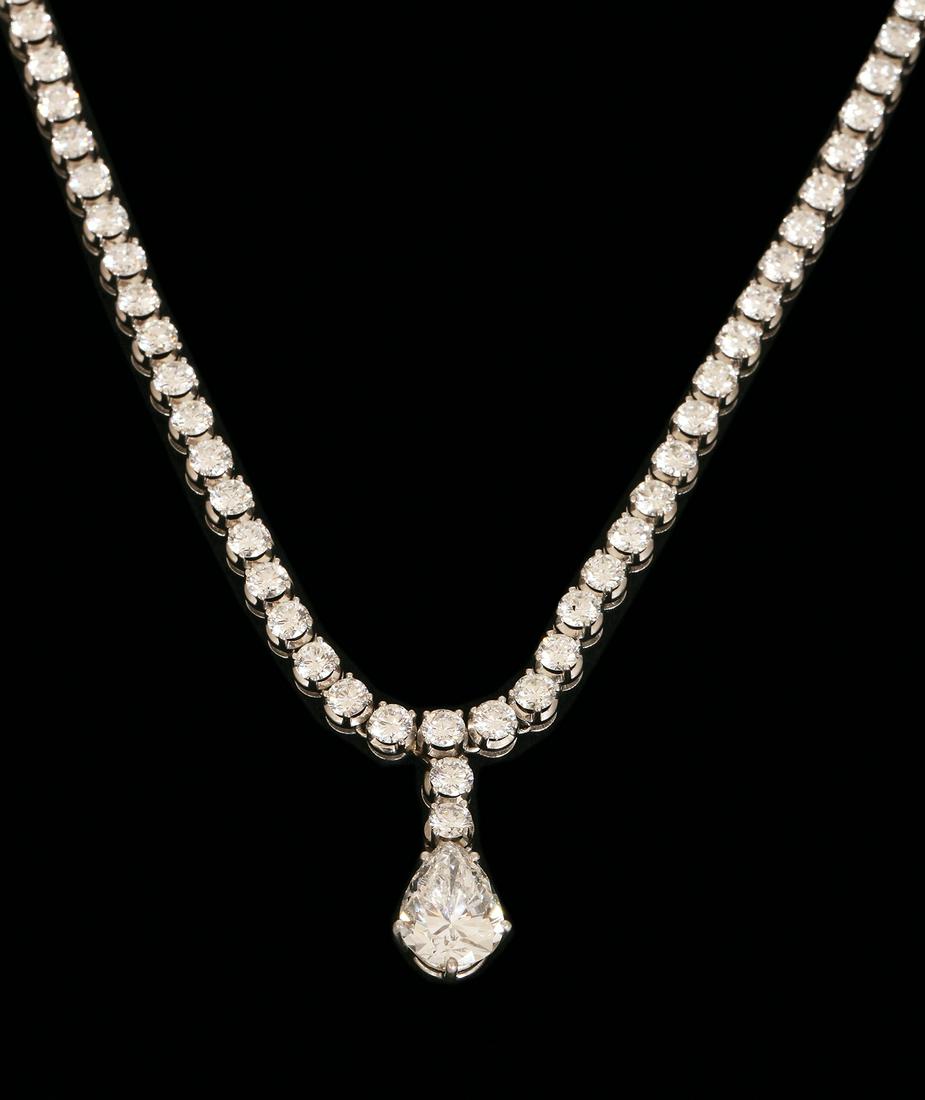 AN 18K WHITE GOLD TENNIS NECKLACE (1 of 3)
