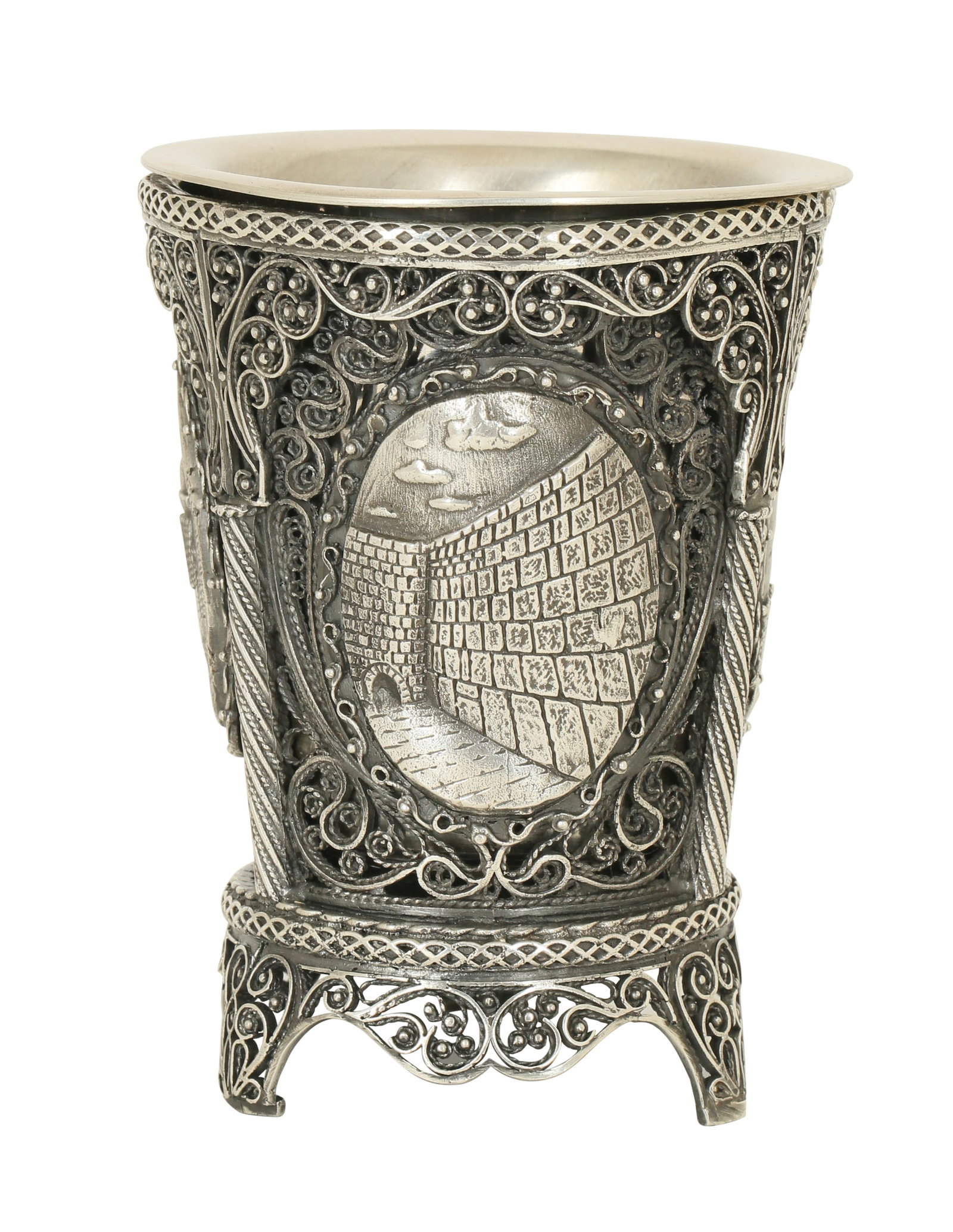 SILVER KIDDUSH CUP: Weight 337 gm. Israel, 20th century. Decorated with fine filigree work and bump decoration in the western wall, the tower of David and Rachel's tomb patterns.
