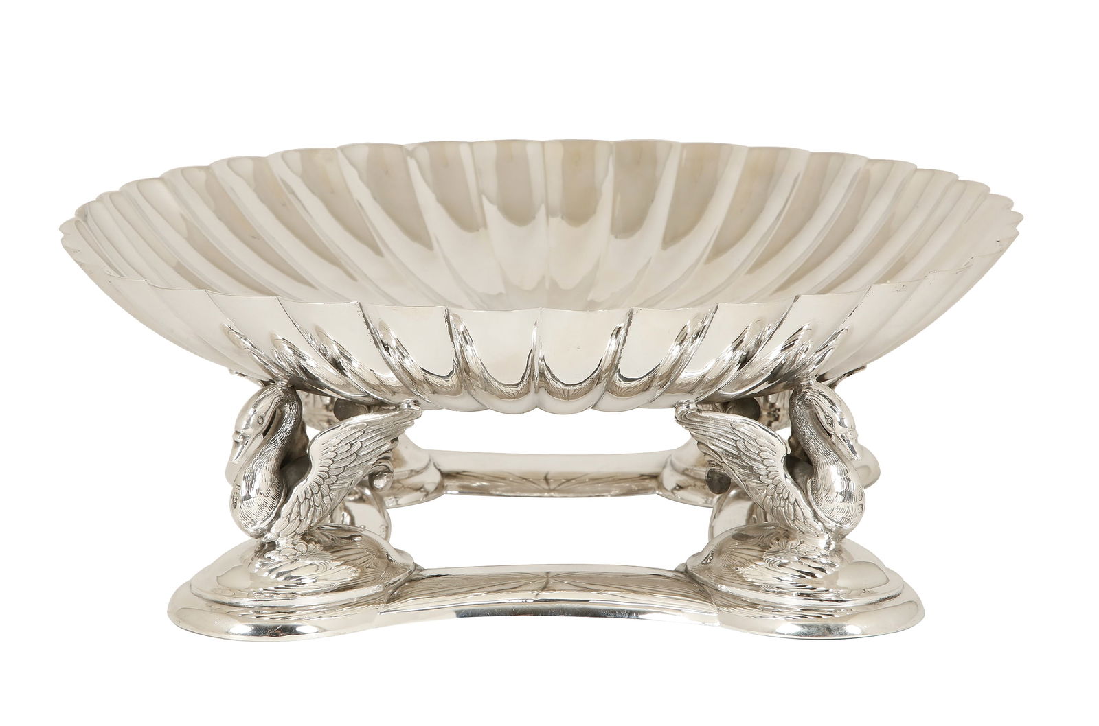 RUSSIAN SILVER CENTERPIECE: Saint Petersburg, 1882–1899. Segmented design. Decorated with four swans supporting the bowl. Weight: approx. 1,184 g. Diameter: 26.5 cm.