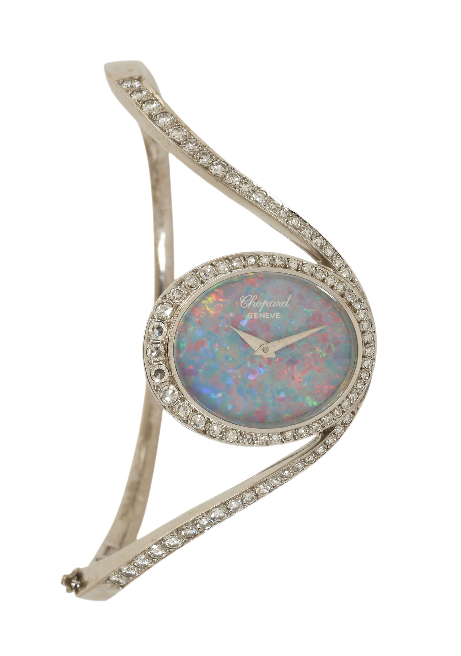 CHOPARD 18K WHITE GOLD WRISTWATCH: Opal dial, mechanical movement, dimensions approx. 24x20 mm, 5045 1. Set with diamonds with a total weight of approx. 1.00 ct. Solid 18K white gold bracelet. Weight approx. 39 grams.