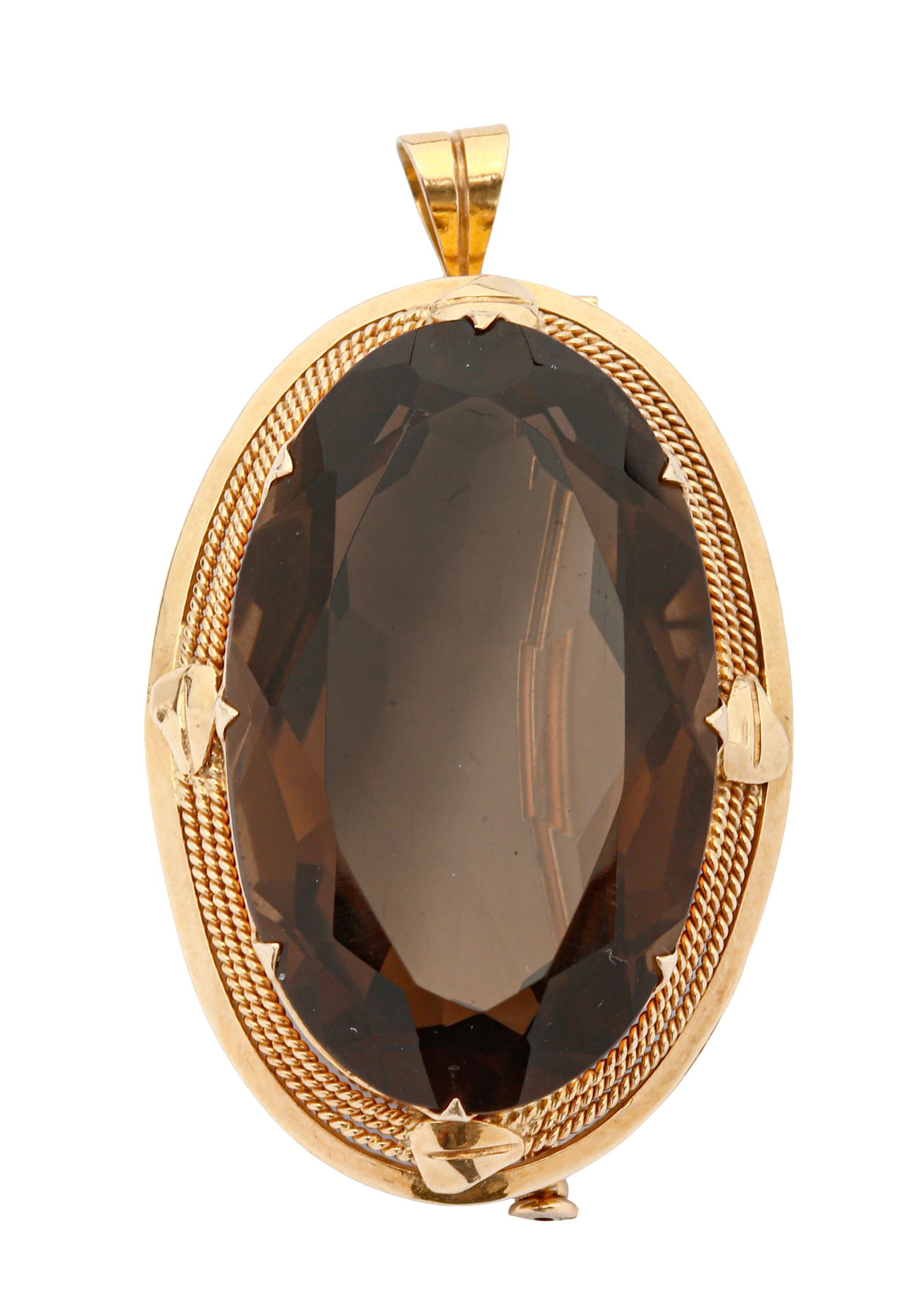 14K GOLD BROOCH / PENDANT: Oval frame decorated with beautiful gold work and set with an oversized smoky quartz. Dimensions approx. 5.5x3.2 cm. Weight approx. 25 grams.