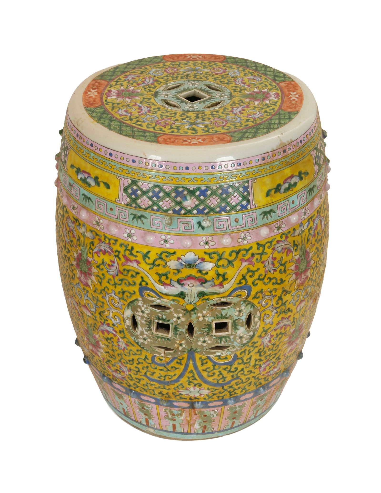 CHINESE GARDEN STOOL: Late qing dynasty, early 20th century. Porcelain. Famille jaune. Decorated with flowers, foliage, and geometric patterns. Height: 46 cm.