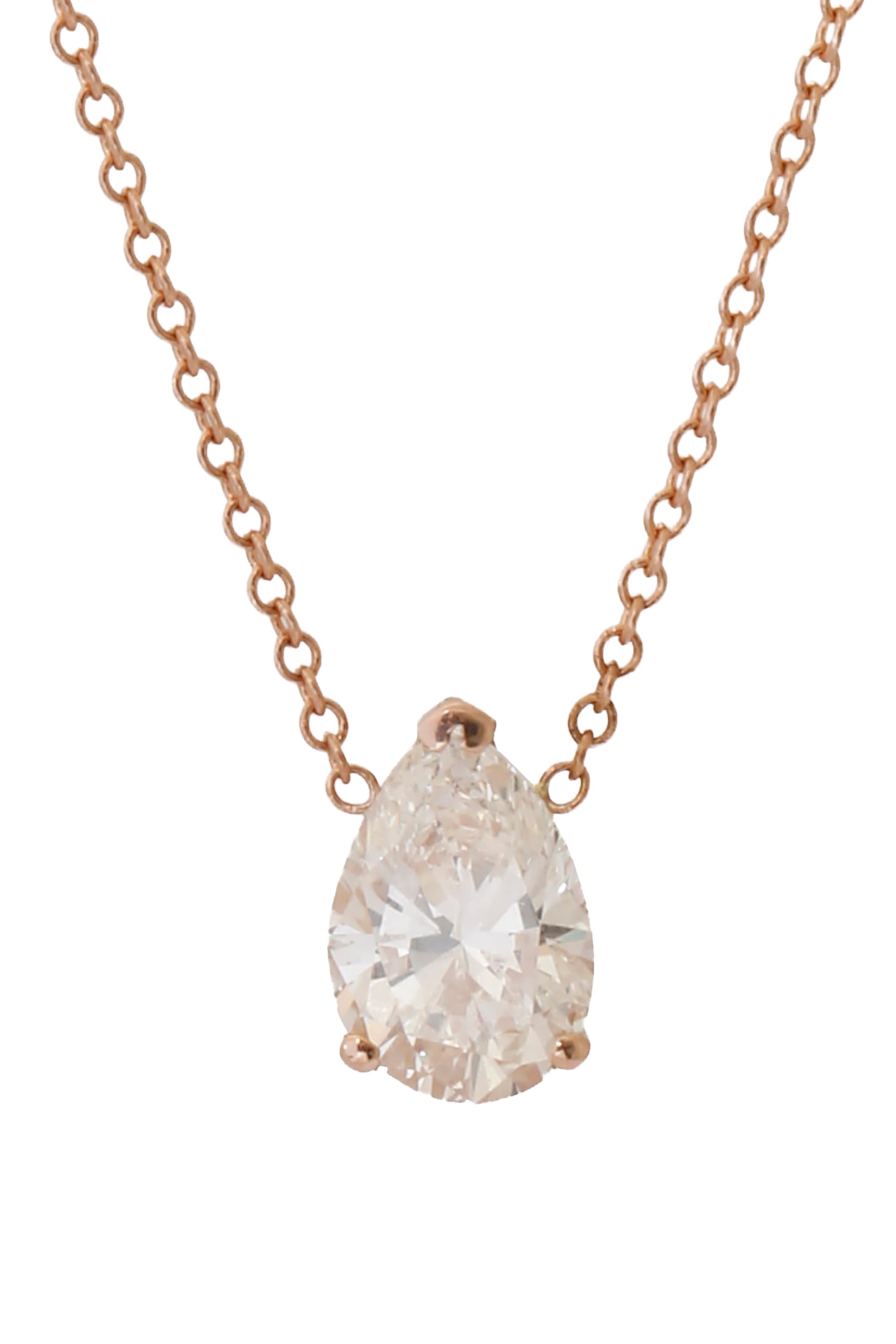 14K ROSE GOLD PENDANT: Set with a solitaire diamond in a pear shape cut weighing 1.01 cts. Includes a 14K rose gold chain. Accompanied by a CGL certificate.