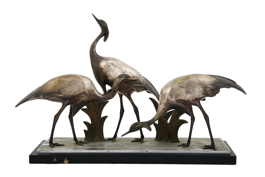 ANDRAS SINKO (HUNGARY, 1901–1976) – THREE CRANES: French bronze sculpture, 20th century. Silvered bronze. Set on a black marble base. Signed. Overall width: 47.5 cm.