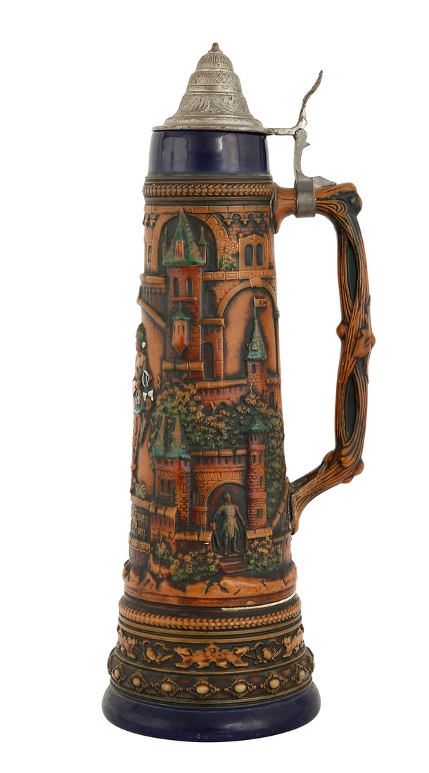 GERZ - LARGE GERMAN BEER STEIN: Ceramic with richly detailed reliefs depicting German castles, figures, inscriptions, landscapes, and architectural elements in a Romantic Neo-Gothic style. Handle shaped as twisted vines and pewter l