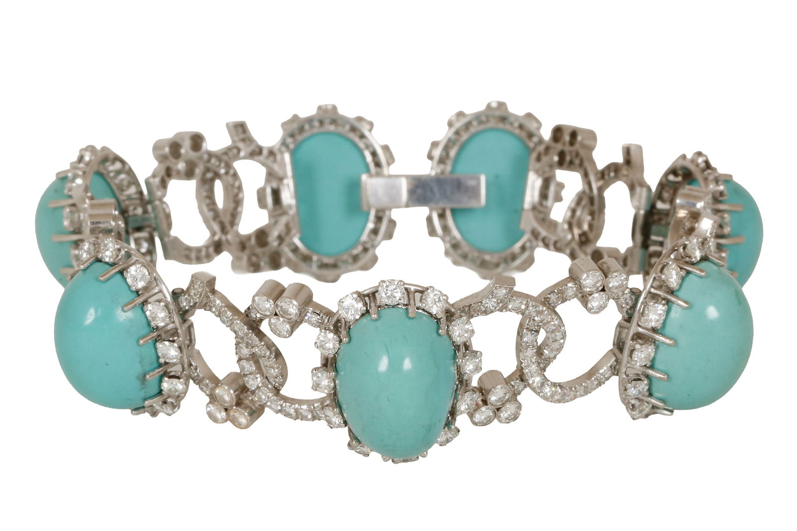 18K WHITE GOLD BRACELET: Composed of links set with diamonds and links set with turquoise and diamonds around them. Total diamond weight approx. 6.00 cts. Length approx. 18 cm. Weight approx. 48.5 grams.