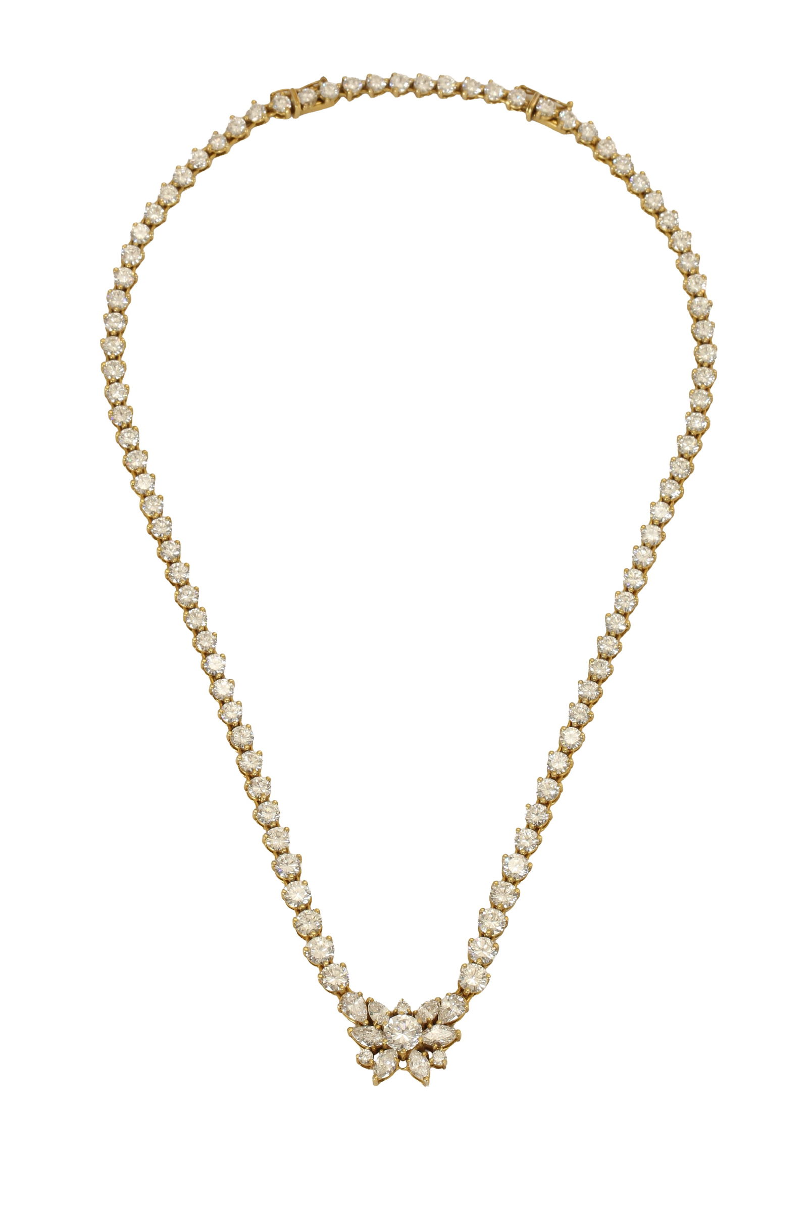 18K WHITE GOLD TENNIS NECKLACE: Set with 102 graduated diamonds and a floral element in the center set with round, pear, and marquise cut diamonds. Total diamond weight approx. 17.00 cts. Length approx. 41 cm. Weight approx. 37.6 gr