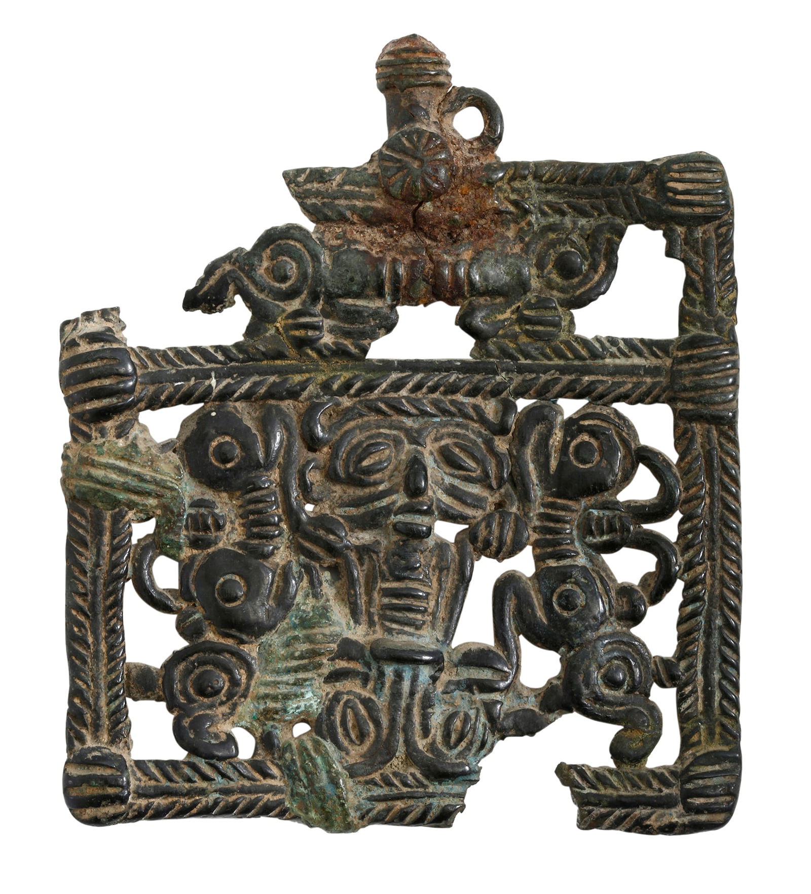 LURISTAN BRONZE - PIN PLAQUE 'MASTER OF ANIMALS': Luristan (western Iran), 7th-8th centuries BCE. Bronze, depicting an anthropomorphic figure flanked by two animals. Height: 10.5 cm. A similar Luristan piece can be seen in the Picker Art Gallery, Col