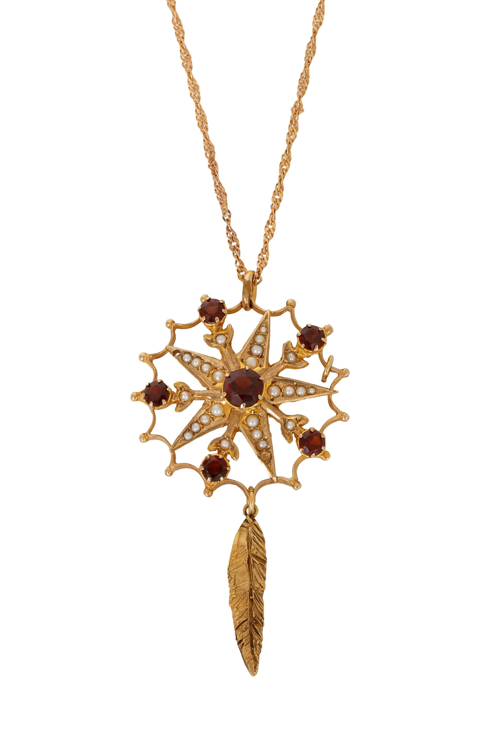 9K ROSE GOLD VICTORIAN PENDANT: Star design set with pearls (one pearl missing) and garnets inside a twisted frame decorated with rivets, carrying a leaf design Pendant in hammered Gold. Includes a 14K rose Gold chain. Signed