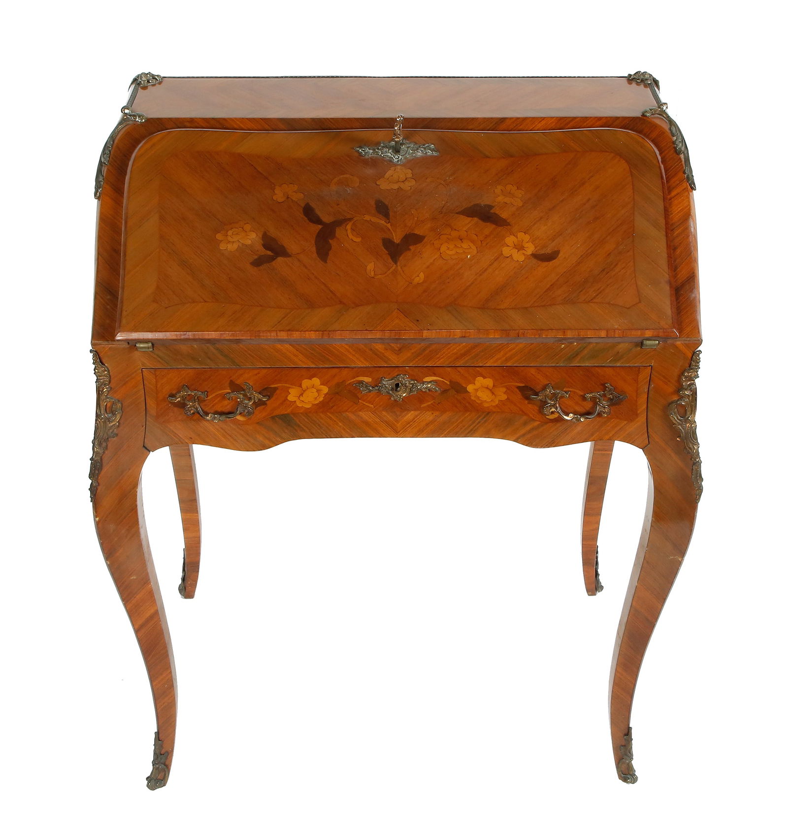 BUREAU EN PENTE - FRENCH WRITING CHEST: Early 20th century. Louis XV style. Made of wood, decorated with floral marquetry and gilt bronze mounts, with frisage veneer. With three drawers and a fall-front writing surface covered in red