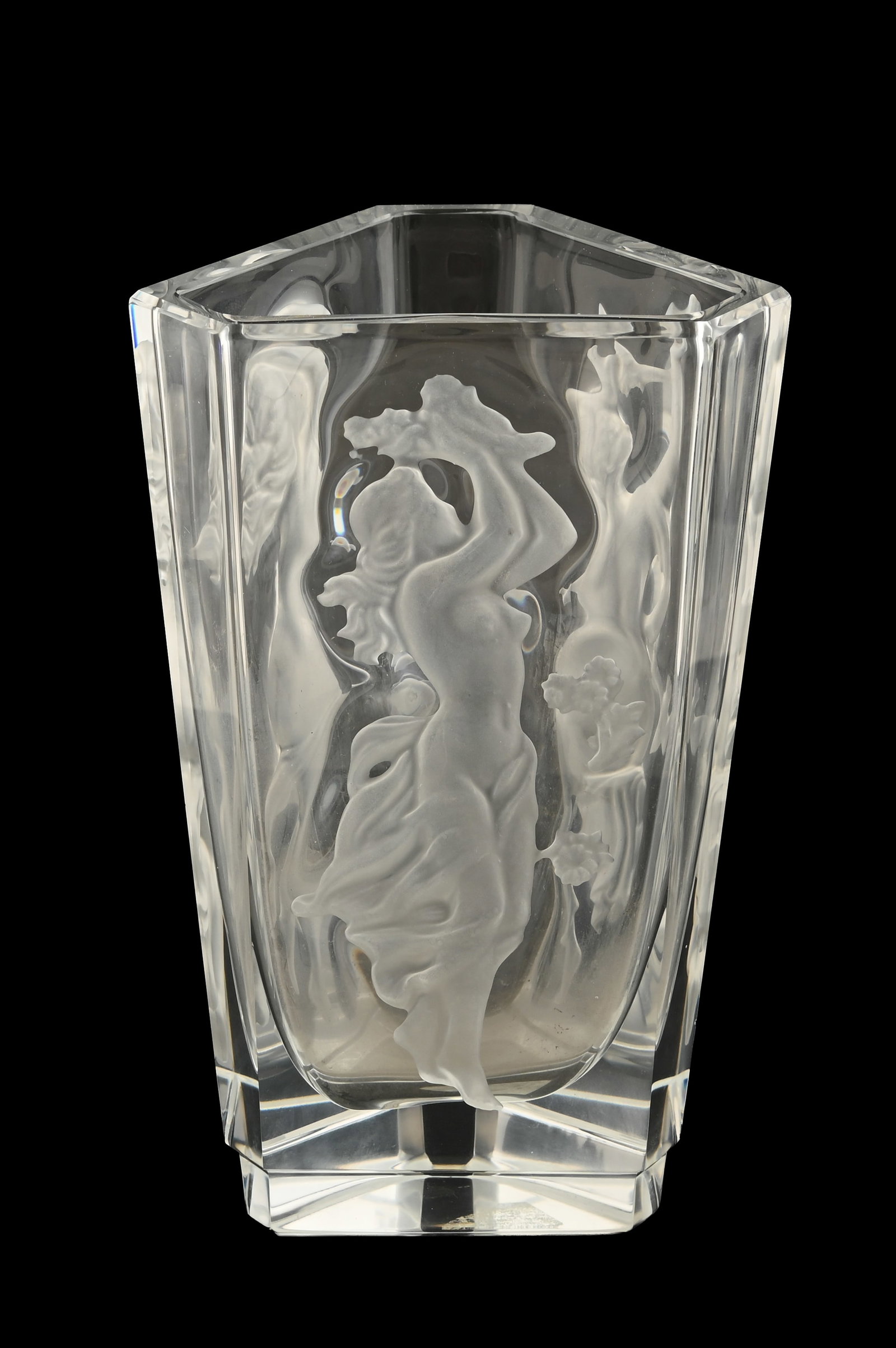 FRANTISEK HALAMA. BOHEMIAN GLASS VASE -? ART DECO: Triangular model. decorated with intaglio engravings of nude women dancing and playing with birds on a clear ground. height: 21 cm. Two tiny, unobtrusive chips.