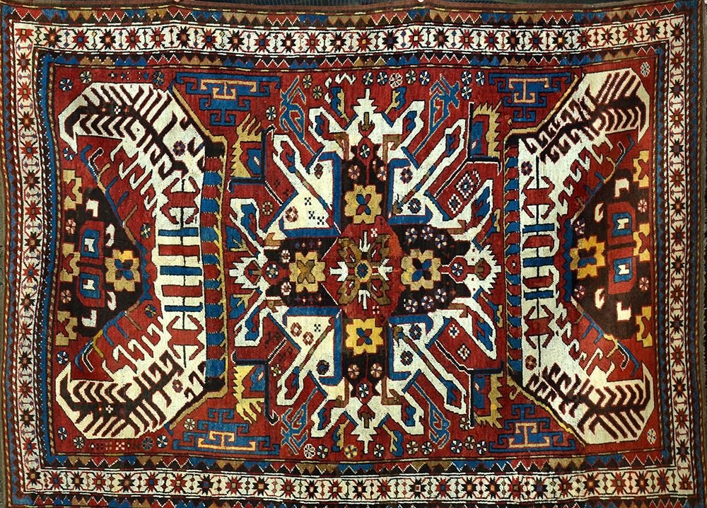 AN ANTIQUE CAUCASIAN RUG (1 of 1)