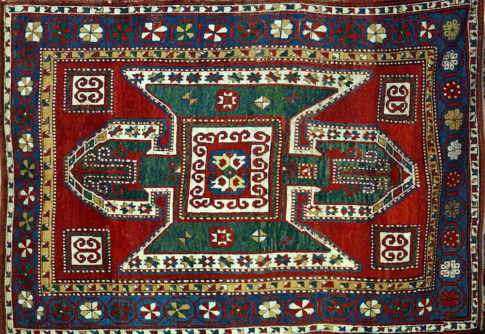 AN ANTIQUE CAUCASIAN KAZAK RUG (1 of 1)