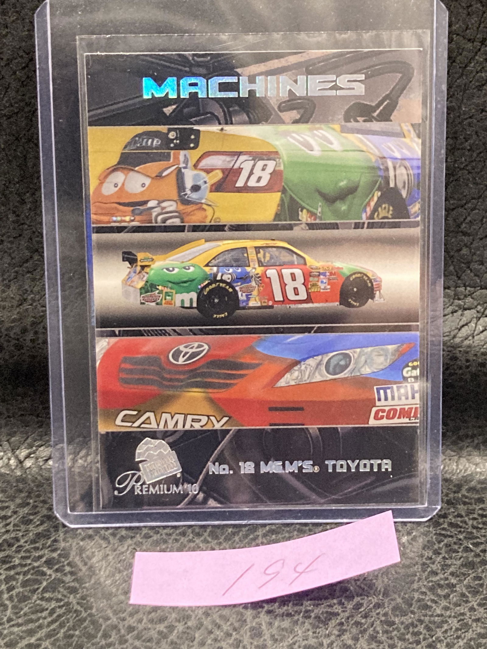 2010 Press Pass Premium Machines No. 18 M&M's Toyota Card #36 (1 of 2)