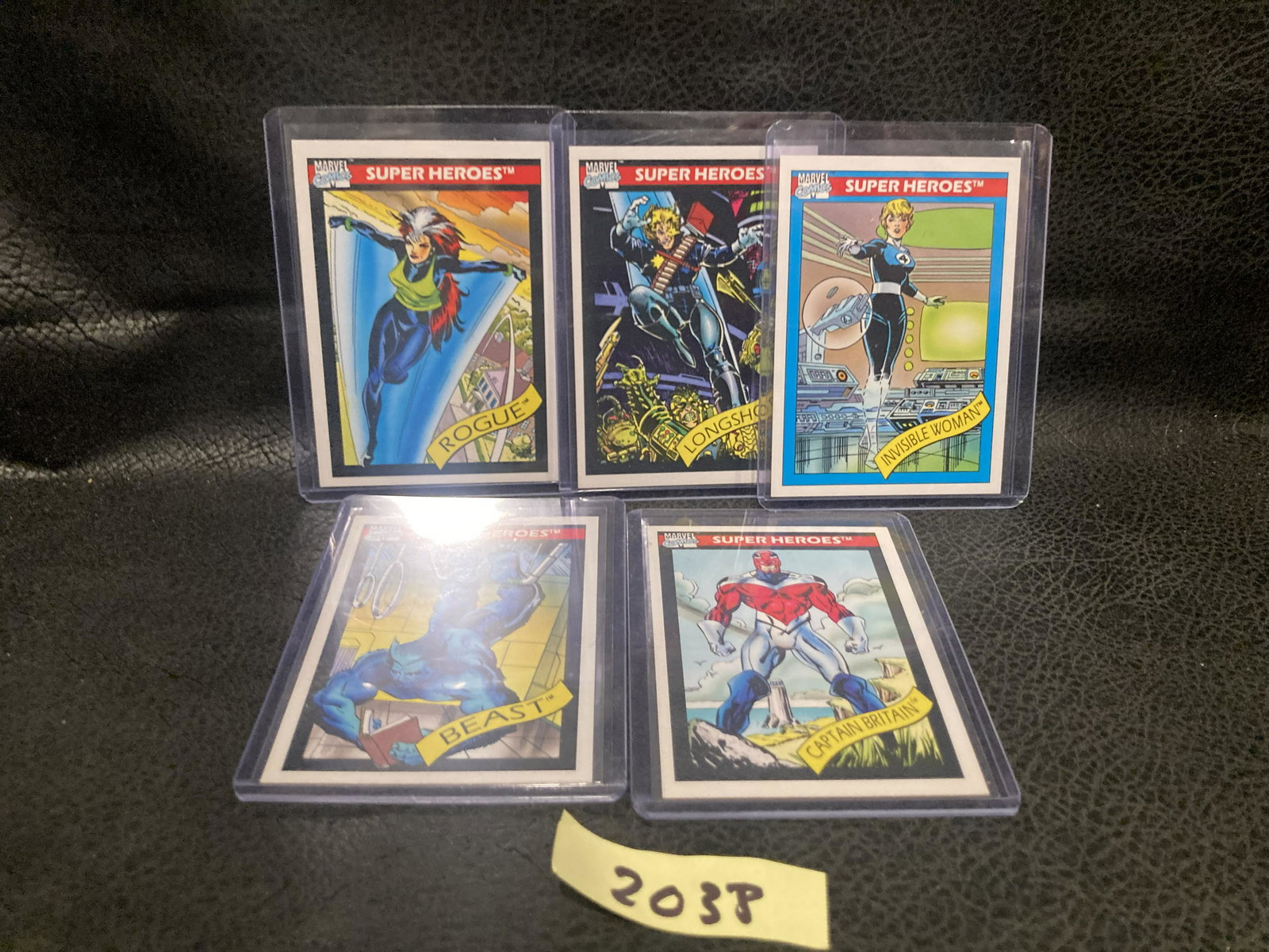 Lot of 5 1990 Marvel Impel Cards: Captain Britain #40 1990 Impel Marvel Universe Trading CardRogue #41 1990 Impel Marvel Universe Trading CardInvisible Woman #43 1990 Impel Marvel Universe Trading CardLongshot #45 1990 Impel Marvel Un