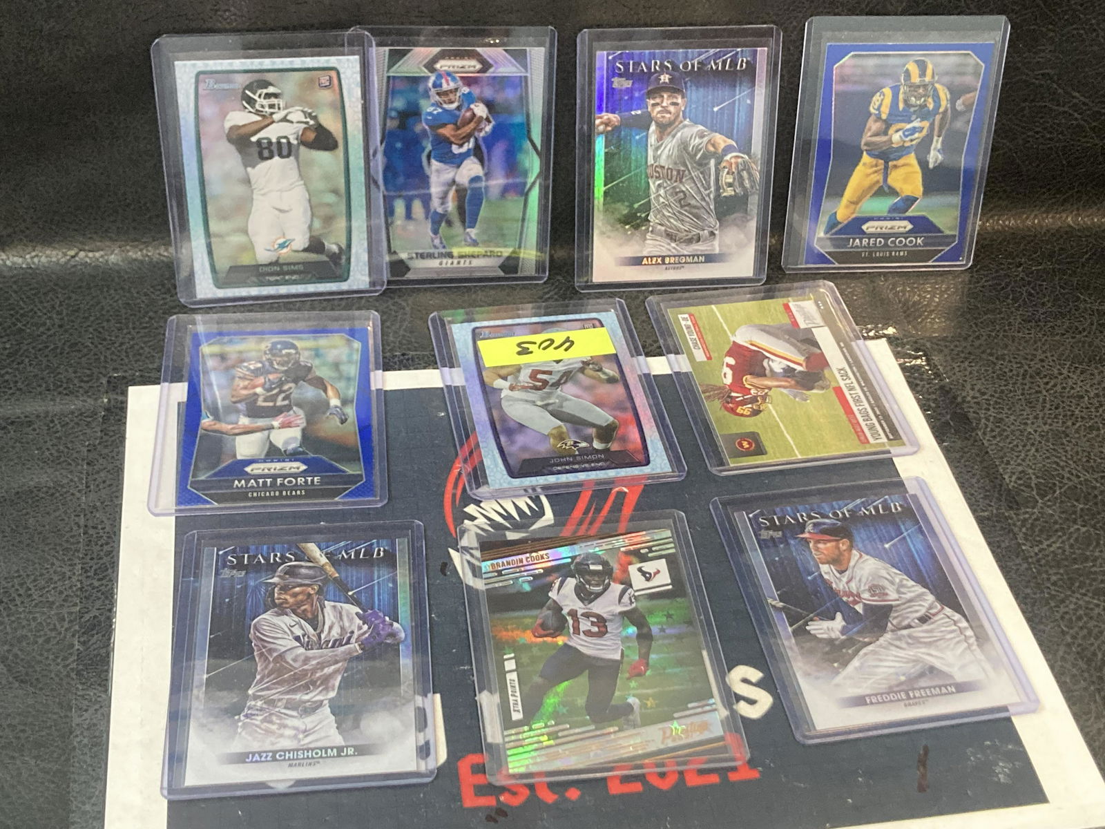 Lot of 10 mixed sports top loaded cards (1 of 2)