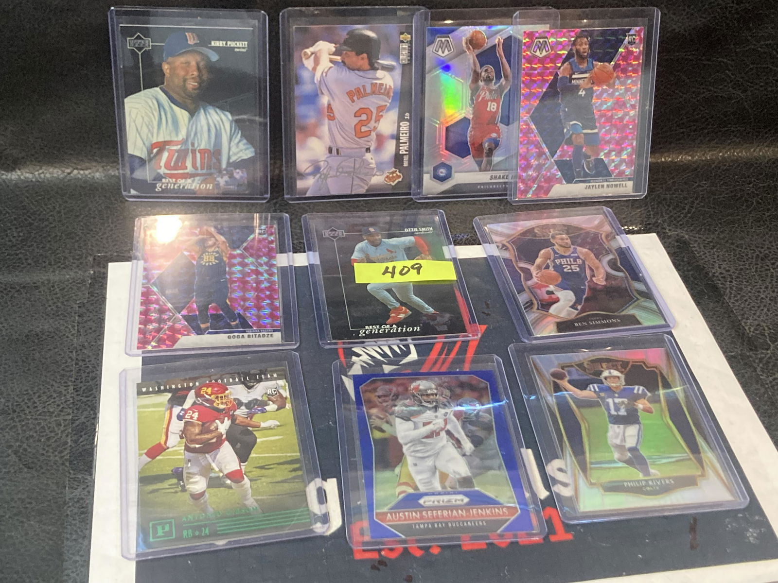Lot of 10 mixed sports top loaded cards (1 of 2)