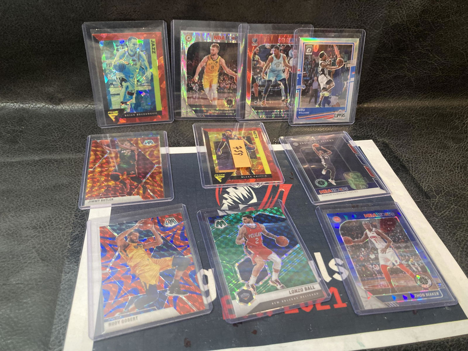 Lot of 10 mixed sports top loaded cards (1 of 2)