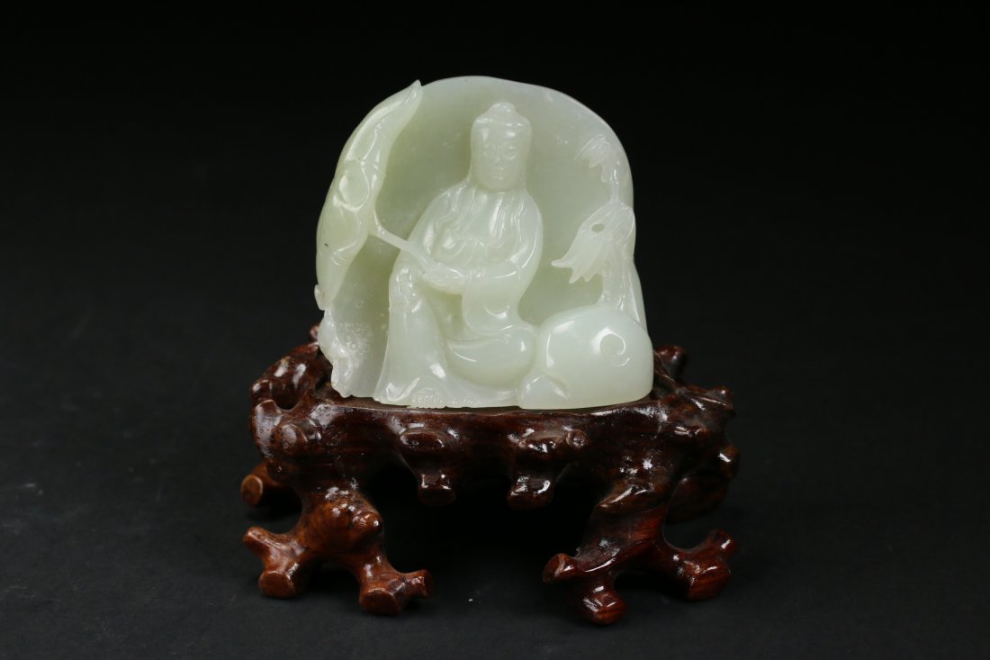 A Carved Pale Green Jade Figure of Buddha, 19th Century (1 of 3)