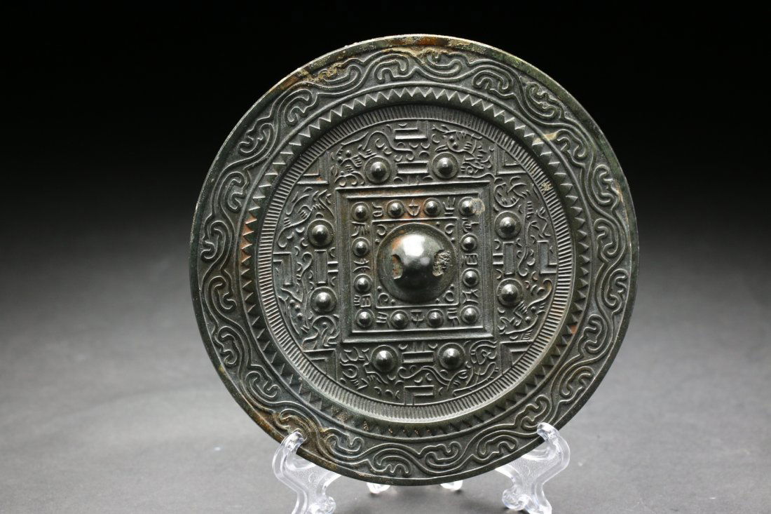 A Chinese bronze mirror,Han dynasty (1 of 3)