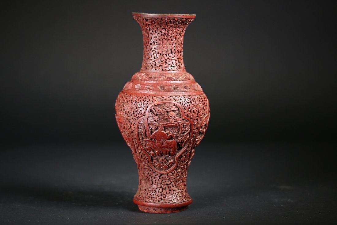 A carved cinnabar lacquer vase,late Qing dynasty (1 of 6)