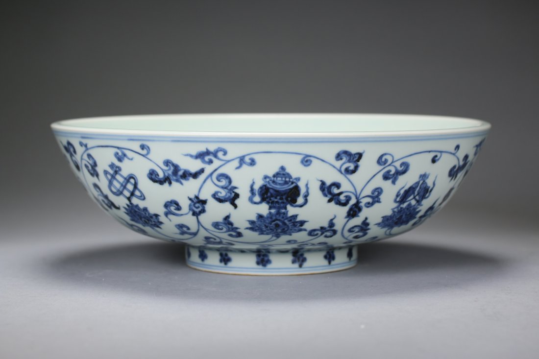 A Chinese Blue and White "Ba Bao" Bowl: Ming Dynasty, Xuan De Period.大明宣德年制青花缠枝莲八宝碗.Diam:11 1/4".