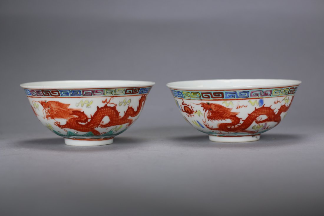 A Pair of Chinese Antique Wucai Porcelain Bowls: A Pair of Chinese Antique Wucai porcelain bowls feature with eastern dragon and phoenix. "Da Qing Guang Xu NIan Zhi" Mark on the base.D:3 7/8 In.,
