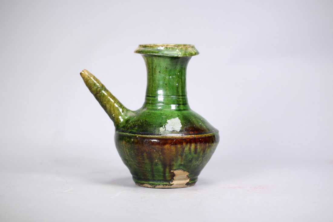 A Chinese green glazed vessel, Han dynasty (1 of 5)