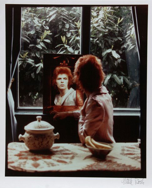 Mick Rock, David Bowie with Mirror, Color Photogra: Artist: Mick Rock, British (1949 - ) Title: David Bowie with Mirror Year: circa 1972 Medium: Color Photograph Size: 24 in. x 20 in. (60.96 cm x 50.8 cm)