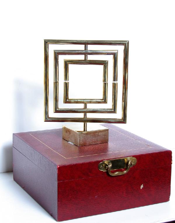 Yaacov Agam, Space Divider, Brass Kinetic Sculpture: Artist: Yaacov Agam, Israeli (1928 - ) Title: Space Divider Year: circa 1980 Medium: Gold-Plated Brass Kinetic Sculpture, signature inscribed Edition: 23/37 H.C. Size: 9 in. x 7 in. x 7 in. (22.86 cm 