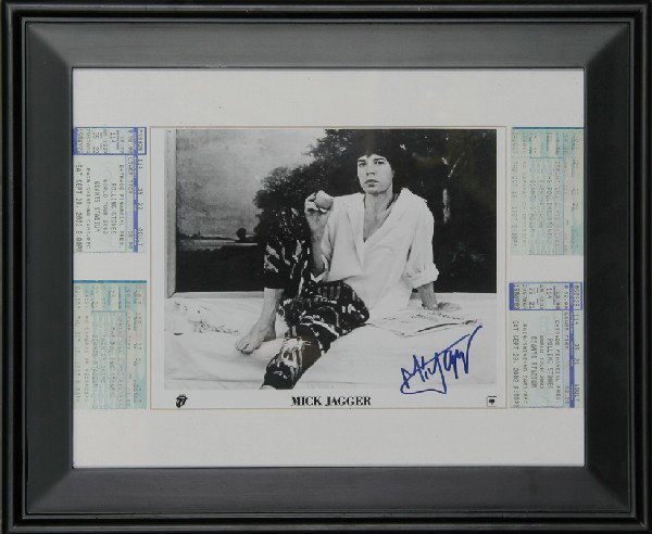Rolling Stones, Mick Jagger Autographed Photograph: Artist: Rolling Stones Title: World Tour 2002 (Mick Jagger) Year: 2002 Medium: Photograph and Concert Tickets in frame, Signed in marker by Mick Jagger Image Size: 7.5 x 9.5 inches Frame Size: 14 x 17