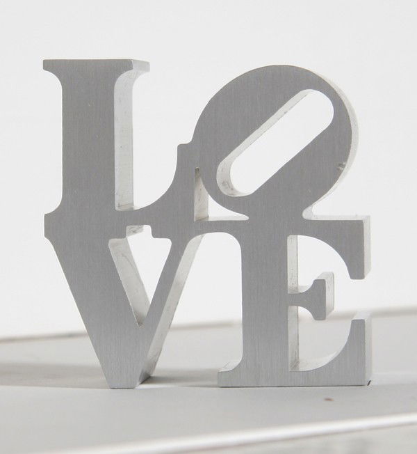 Robert Indiana, LOVE - Silver, Aluminum Sculpture: Artist: Robert Indiana, American (1928 - ) Title: LOVE - Silver Medium: Aluminum Sculpture Size: 3.5 in. x 3 in. x 2 in. (8.89 cm x 7.62 cm x 5.08 cm)