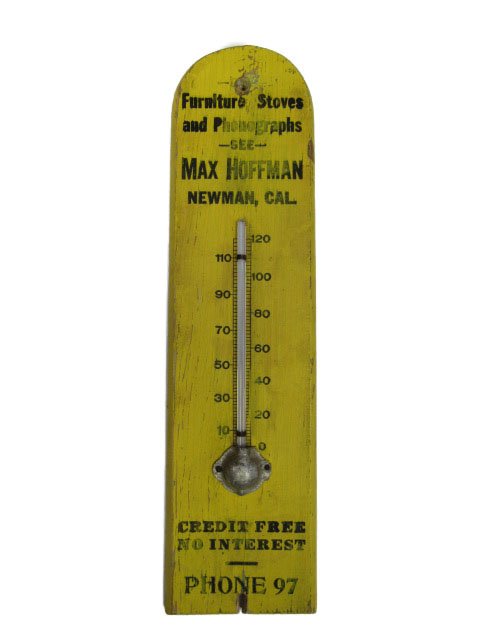 Wood Advertising Thermometer: 3" x 11.5". Some chipping and minor imperfections. Otherwise good condition. Advertising "Furniture, Stoves and Phonographs".