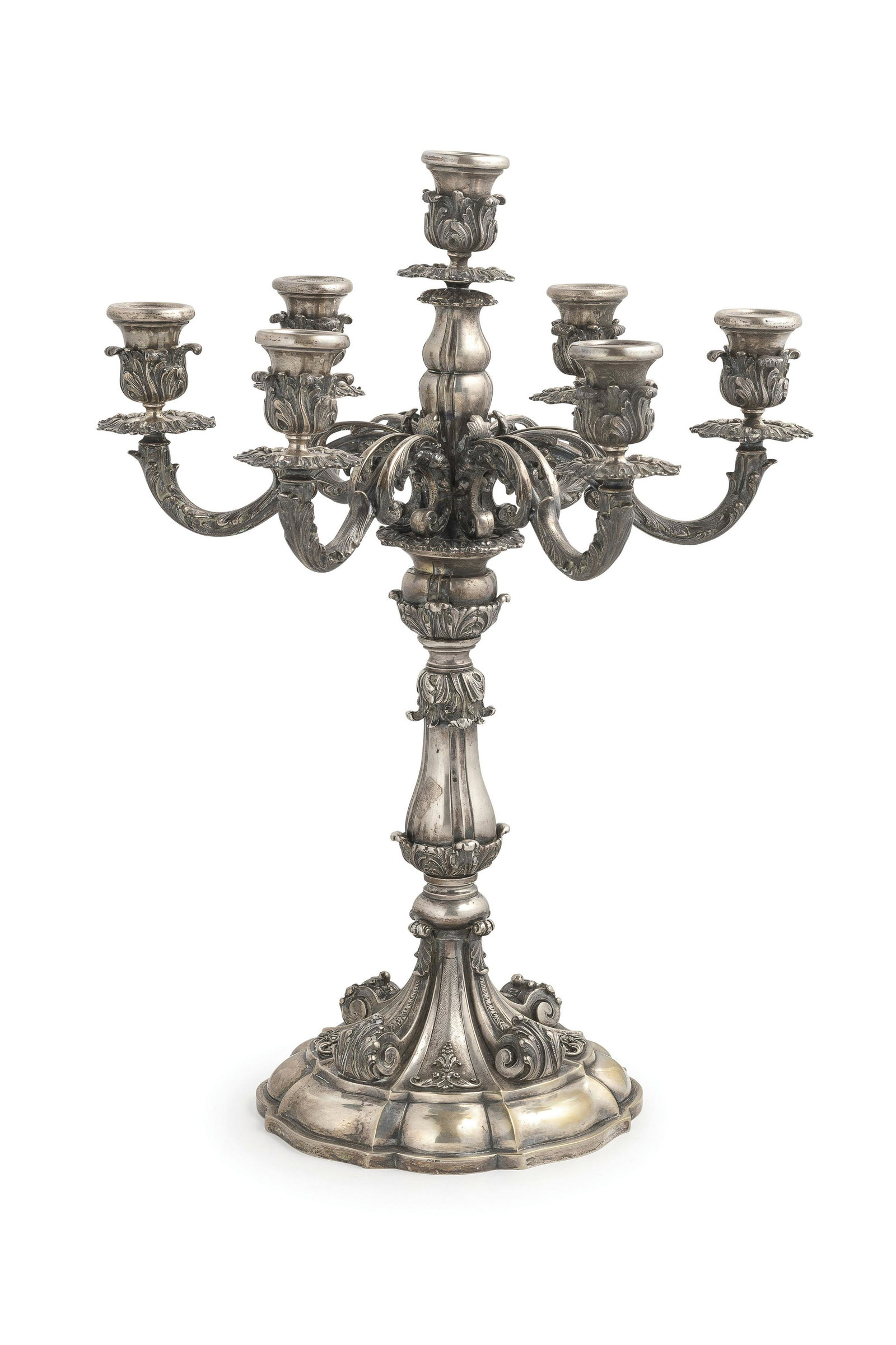 CANDELABRO IN ARGENTO, MILANO, 1935-1945, ORAFO M.: base dal bordo mistilineo, fusto decorato a motivi naturalistici, a sette luci; usure Alt. cm 53, larg. cm 39; peso gr 4700 AN ITALIAN SILVER CANDELABRUM, MILAN, 1935-1945, MARKS OF M. BUCCELLATI; WEA