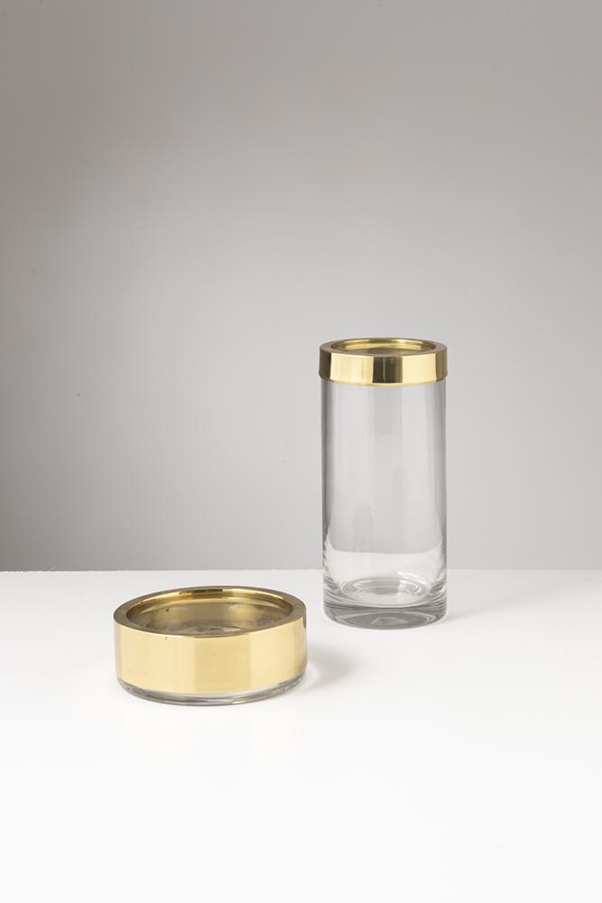 CARLO NASON: Due vasi. Cristallo molato, ottone dorato. Produzione Mazzega 1976 ca. cm 30x14; cm 7x19,5 A VASE AND AN ASHTRAY BY C. NASON Ottime condizioni generali. Trascurabili righe e graffi fotto la base.