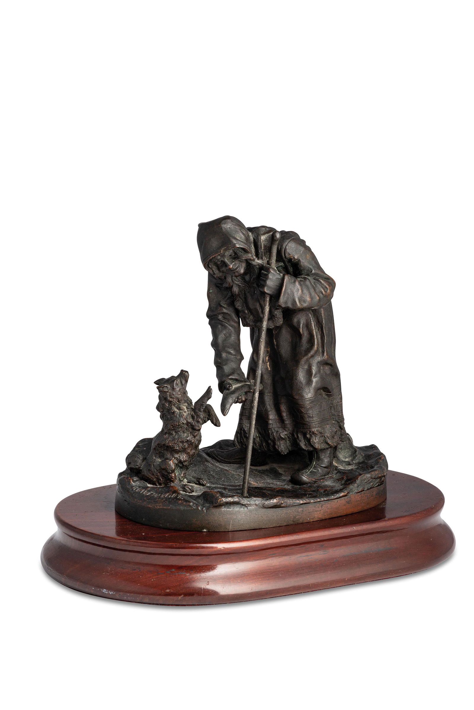 GRUPPO IN BRONZO SU BASE LIGNEA: SAN PIETROBURGO, 1880-1890, FIRMATO GRACHEV, FONDERIA WOERFELL raffigurante donna anziana che ciba un cane con un pesce; usure Alt. cm 16, larg. cm 15,6, prof. cm 10 (con base cm 18x23,5x14,5) A RUSSI