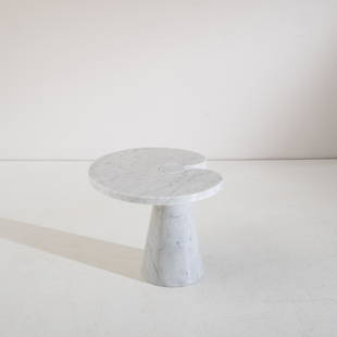 ANGELO MANGIAROTTI: Tavolino della serie Eros. Marmo di Carrara tornito. Produzione Skipper anni '90. cm 41x55x48 A SIDE TABLE BY A. MANGIAROTTI Casa Amica, 11 maggio 1971, pp.24-24; Domus n.505, dicembre 1971, p. 37; Fo