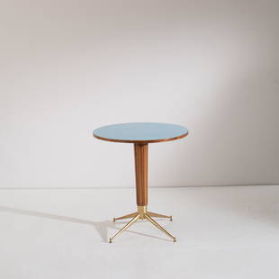 MELCHIORRE BEGA (ATTRIB. A): Tavolo servo muto. Ottone, legno, formica. Italia anni '50. cm 77x70 A SIDE TABLE ATTRIBUTED TO M. BEGA Buone condizioni generali. Piccole righe, leggeri graffi, normali segni di usura. Ottone in pati