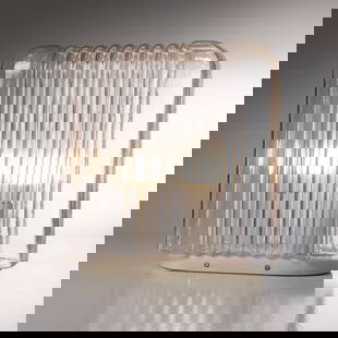 ANGELO MANGIAROTTI: Lampada da tavolo mod. Lari. Vetro pressato, alluminio goffrato e verniciato. Produzione Artemide 1978 ca. cm 37x35x17 A TABLE LAMP BY A. MANGIAROTTI C, e D. Krzentowski, The Complete Designer' Lights