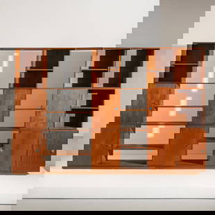 FINN JUHL: Libreria mod. Cresco. Metallo cormato, legno di teak. Produzione France & Sons. Etichetta del produttore. cm 205,5x313x47 A MODULAR BOOKCASE BY F. JUHL Buone condizioni generali. Piccole righe, legger