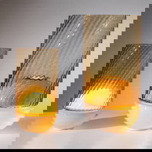 EZIO DIDONE: Due lampade da tavolo. Vetro trasparente colorato e vetro lattimo, ottone verniciato. Produzione La Murrina anni '70. cm 55x27; cm 39,5x20,5 TWO TABLE LAMPS BY E. DIDONE Buone condizioni generali. Pic