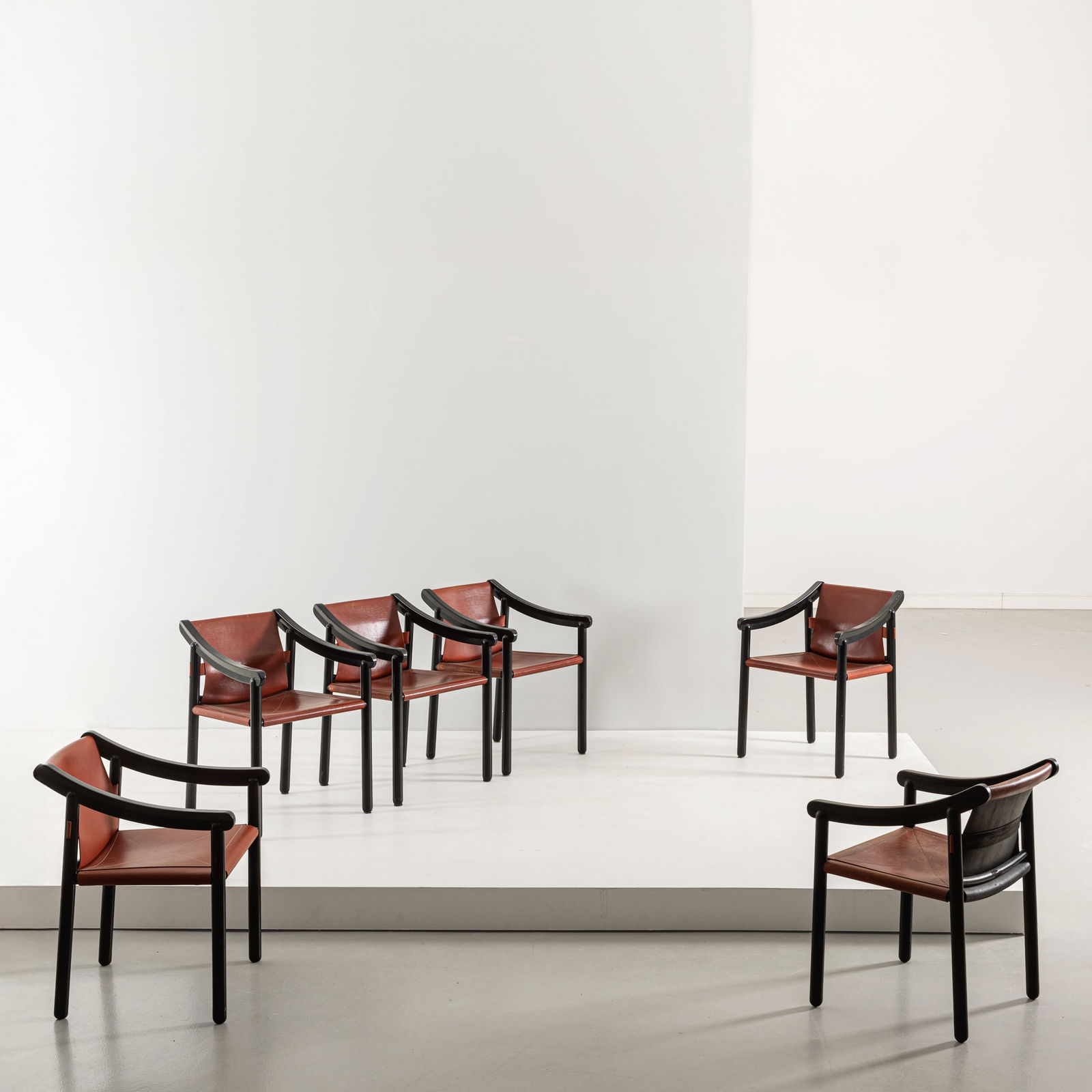 VICO MAGISTRETTI: Sei poltroncine mod. 905. Legno tornito e verniciato, pelle. Produzione Cassina 1964 ca. cm 76x56x60 SIX CHAIRS BY V. MAGISTRETTI Domus n.418, settembre 1964, p. 30-Abitare n.29, ottobre 1964, p. 27;