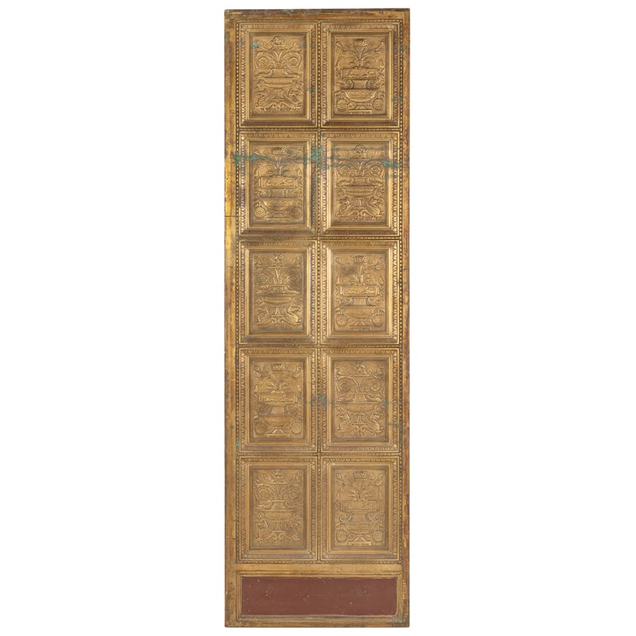 COPPIA DI PORTALI IN BRONZO DORATO, XIX-XX SECOLO: scanditi da dieci formelle ciascuna e ornati con fitto decoro tratto da repertori classici e rinascimentali, la zoccolatura dipinta; difetti, tracce di ossidazione e brunitura, graffi e ammaccature Cm