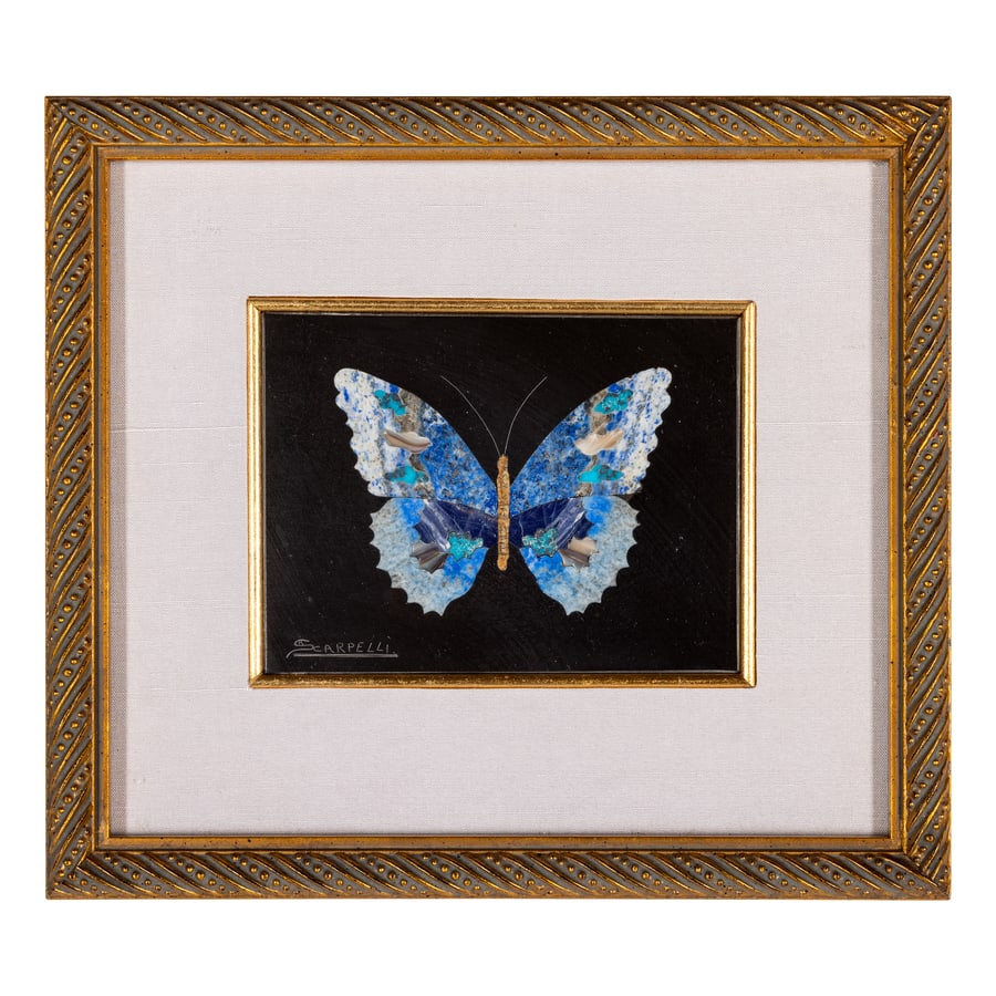 PLACCA IN MARMI DIVERSI, XX SECOLO: raffigurante farfalla policroma su base in nero del Belgio, monta in cornice della Maison Blue Skies frame co; minori difetti Cm 9X11,7 Cornice, cm 20X22,5 A VARIOUS MARBLE PLAQUE, 20TH CENTURY; MINOR