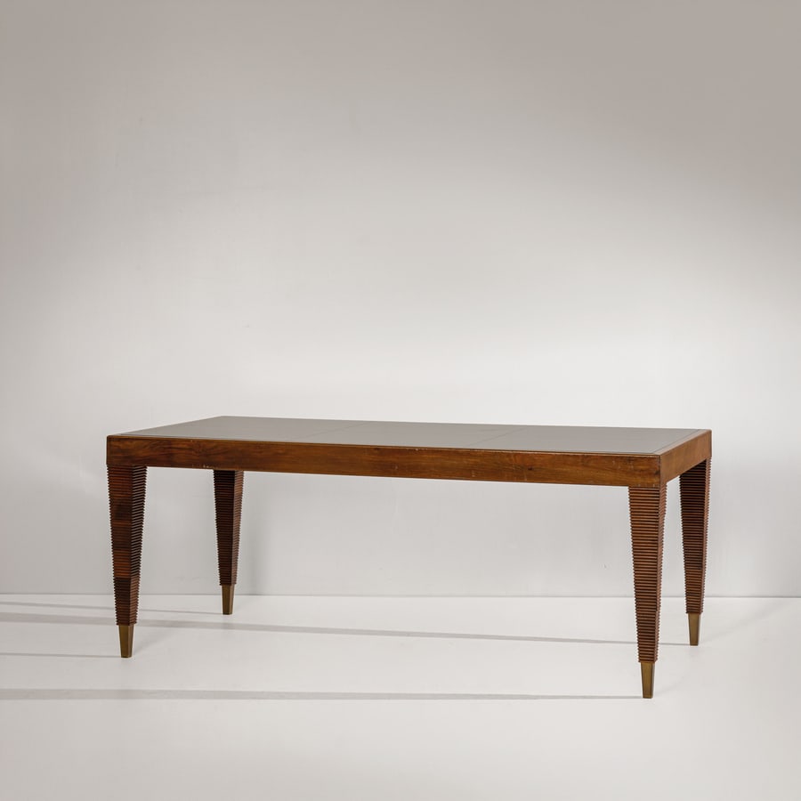 GIO PONTI: Tavolo. Legno di noce, ottone, vetro opalino. Italia fine anni '20. Perizia Gio Ponti Archives. cm 79,5x196,5x96 A DINING TABLE BY G. PONTI